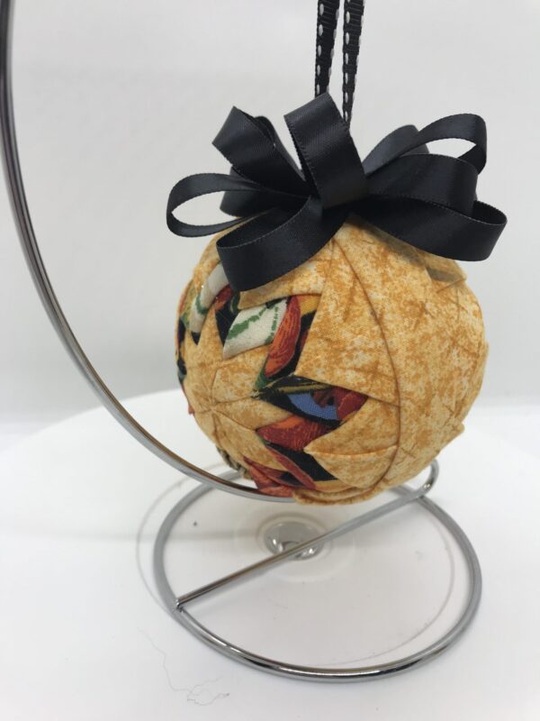 Golden 3" Round Ornament with Basic Star Pattern with fruit printed fabrics, black bow and hangerjpeg