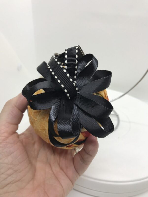 Top Ribbon View Golden 3" Round Ornament with Basic Star Pattern with fruit printed fabrics, black bow and hangerjpeg