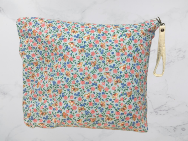 11" x 13" hand-sewn zippered bag with wristlet made with repurposed fabric