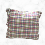 Eleven by thirteen inch project bag handcrafted with pink plaid upcycled fabric. Has a zipper closure with an accessible handle attached to the zipper.